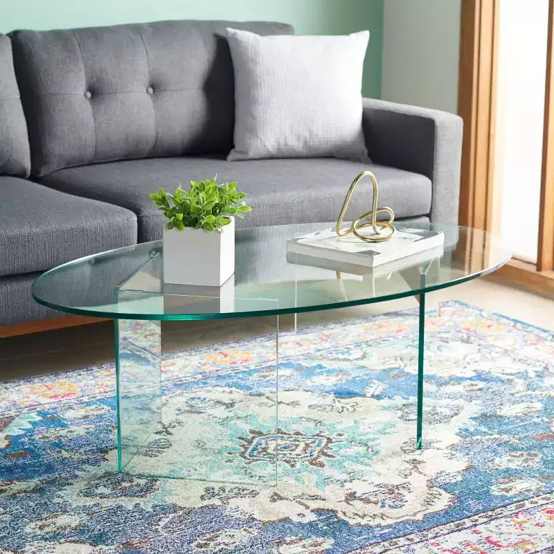 Table basse en verre trempé avec cadre géométrique en métal
