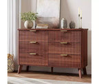 Commode à 6 tiroirs en bois avec façades cannelées et poignées dorées 119 cm