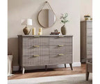 Commode à 6 tiroirs en bois avec façades cannelées et poignées dorées 119 cm